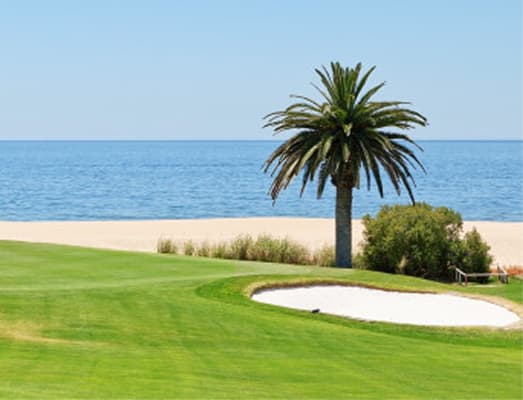 Golf course by ocean