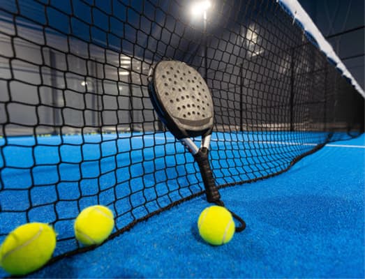 Padel racquet on court